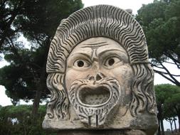 Roman stone face