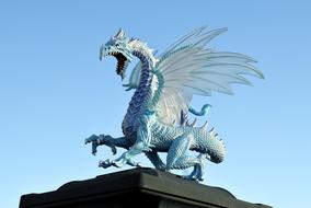 blue mystical dragon sculpture on the temple