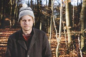Strange Man in forest at fall