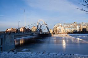 Beautiful landscape with the Lazarev bridge, among the snow in St Petersubrg, Russia