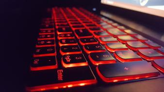 black Laptop Keyboard with red backlighting