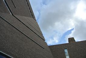 stone facade with clouds