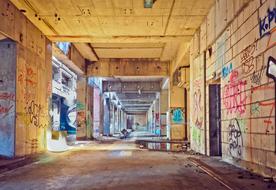 multi-colored graffiti in an abandoned tunnel