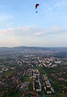 Person, doing paragliding, above the beautiful and colorful Baranya, Hungary