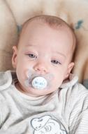 Kid with a pacifier