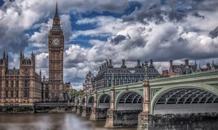 storm clouds over the architecture of old london