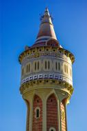 tower in barcelona against the blue sky