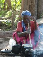 woman prepares dish