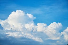 Blue Sky with tall cumulus clouds, Background