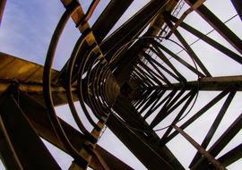 Bottom view of the steel crane tower in Coimbra, Portugal