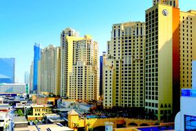 multi-story residential buildings along the beach in Dubai