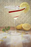 cocktail in glass with lemon