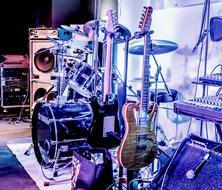 Stage Drums and Guitar