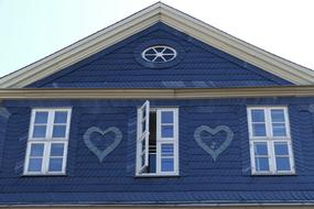 Beautiful, blue house with hearts in the historic center