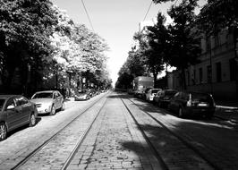 tram rails on the streets of helsinki in black and white background