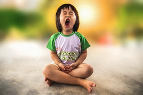 photo of Yawning Little Girl