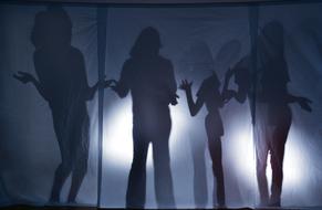 silhouette of a confused girl