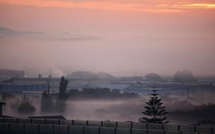 fog over the hills in the morning in winter