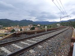 landscape of Railway near old town at cloudy day