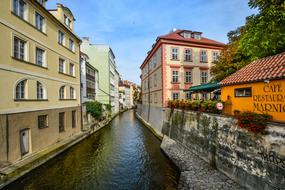 photo of buildings on the canal in Prague