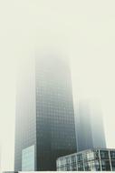 office buildings in paris in dense fog