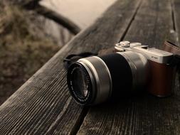 photography camera on wood board