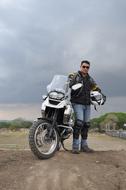 white motorcycle with a man