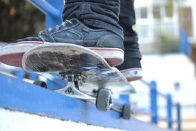 feet of child boy on Skateboard