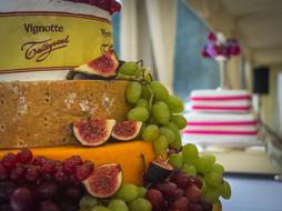 cheese garnished with grapes