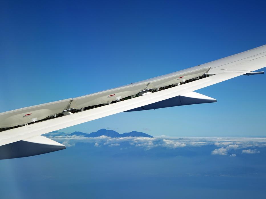 beautiful view of an airplane wing in the sky