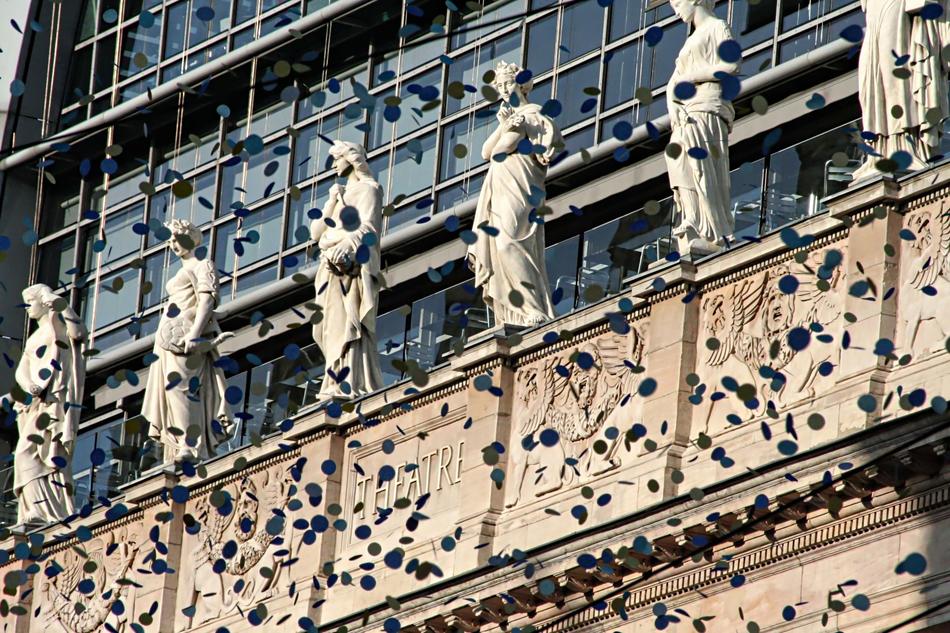 confetti on the background of the theater building in France