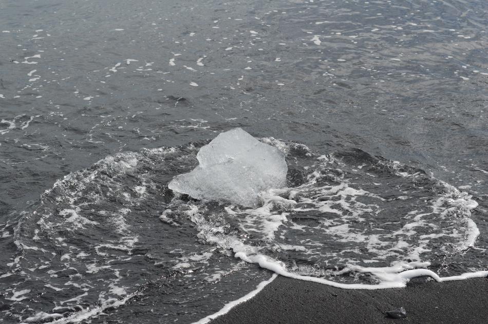 Piece Of Ice On Beach