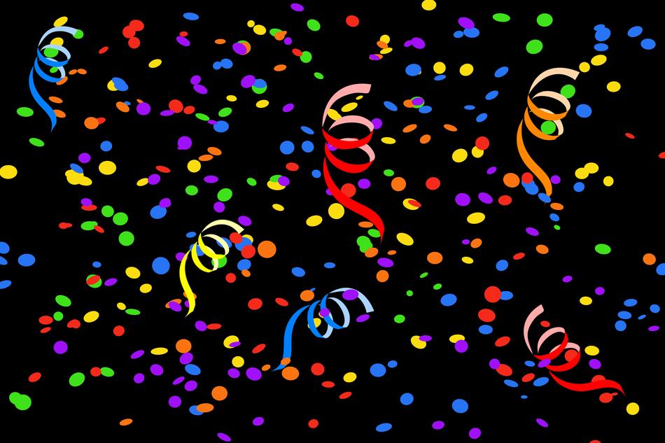 colorful confetti and streamers at dark background