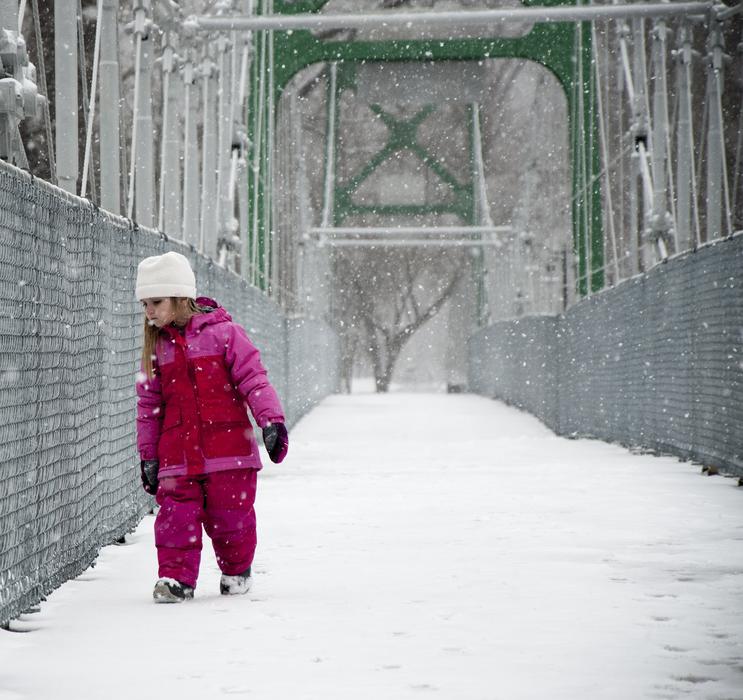 Girl Snow on Bridge