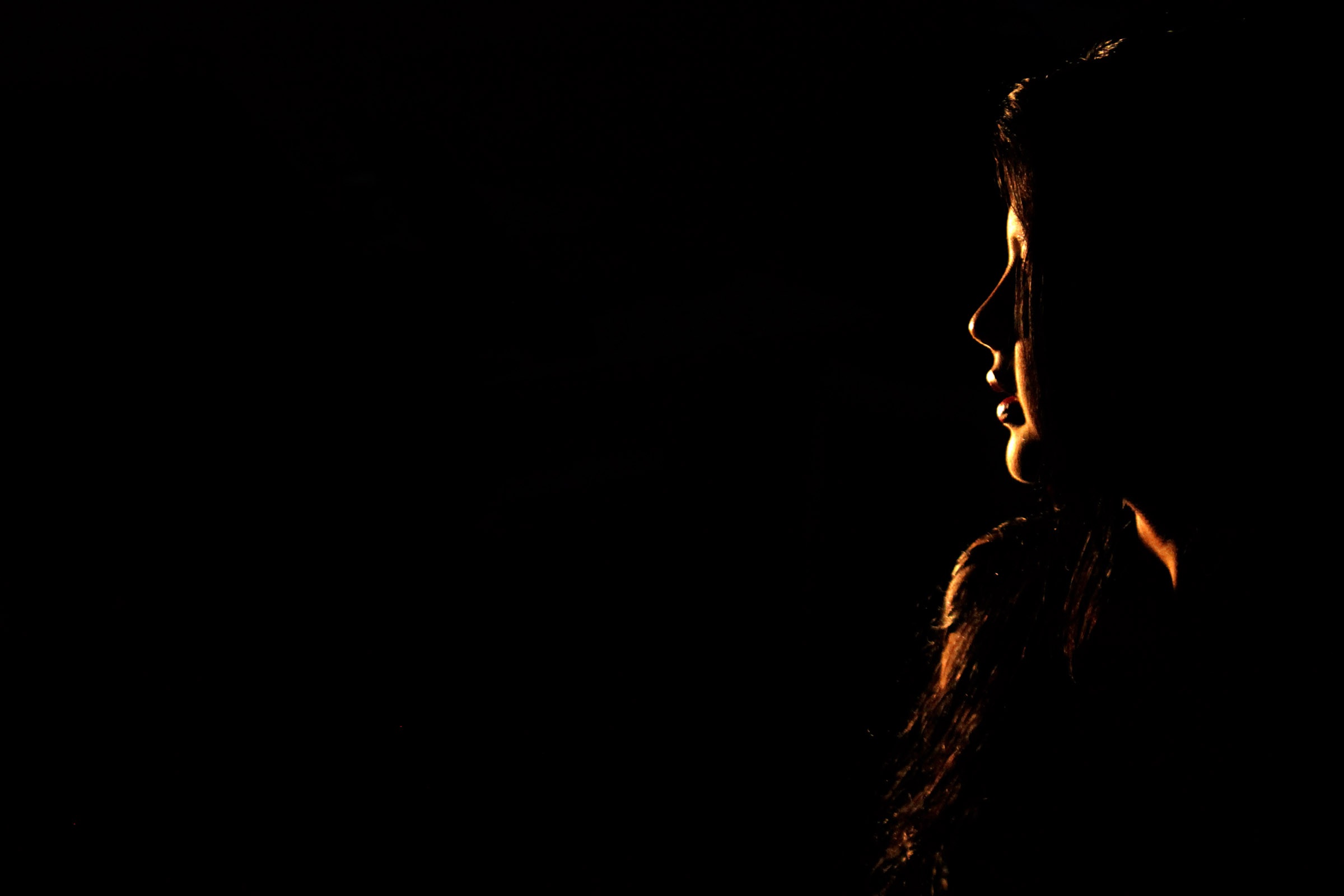 Woman in darkness, head Portrait free image download