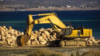 Digger Heavy Machine Working on coast