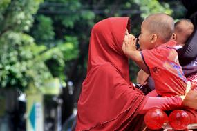 mom and baby hugs