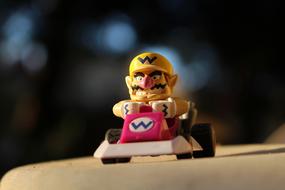 toy wario on the car