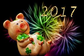 happy ceramic pig on a greeting banner