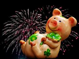 lucky pig figurine with clover