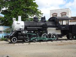 old black train at the station