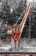 vintage old crane on the railroad