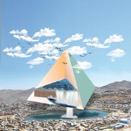 Colorful pyramid house with the painting, on the mountains, under the blue sky with white clouds
