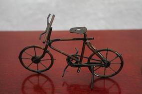 iron bicycle on a red background
