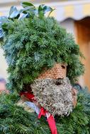 old man made of wood statue