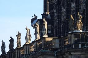 stone statues by the church
