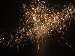 bright flashes of fireworks in the sky