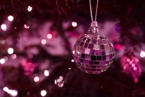 Beautiful shiny disco ball with purple shades