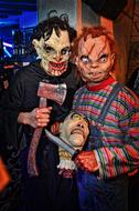people in scary halloween costumes
