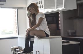 girl in the kitchen with coffee